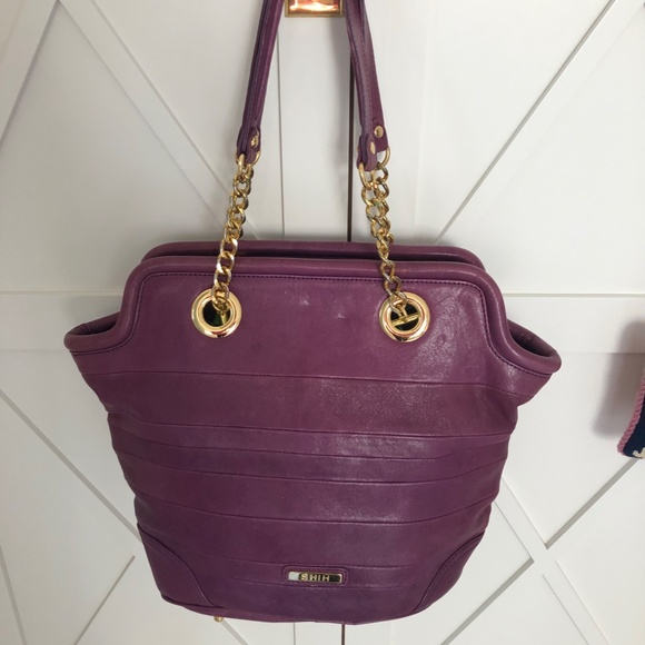 Shih purple leather handbag; 16" w x 12" h (21" bottom of bag to top of strap) - Picture 2 of 6